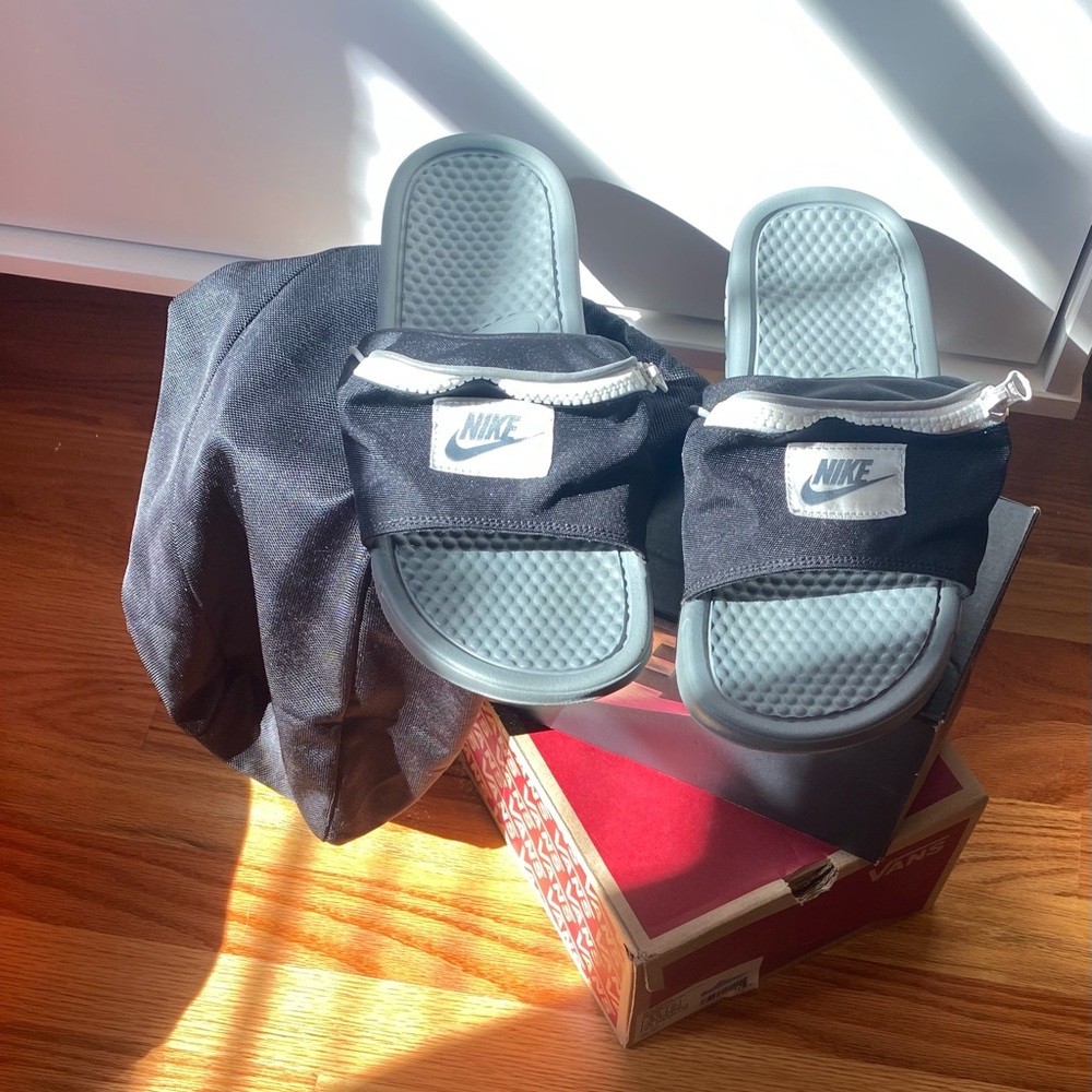 Pair of Nike slides with pockets brand new